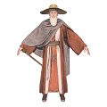 Elderly Bearded Man In Brown Traditional Robe With Gray Cloak And Wide Brimmed Hat Standing